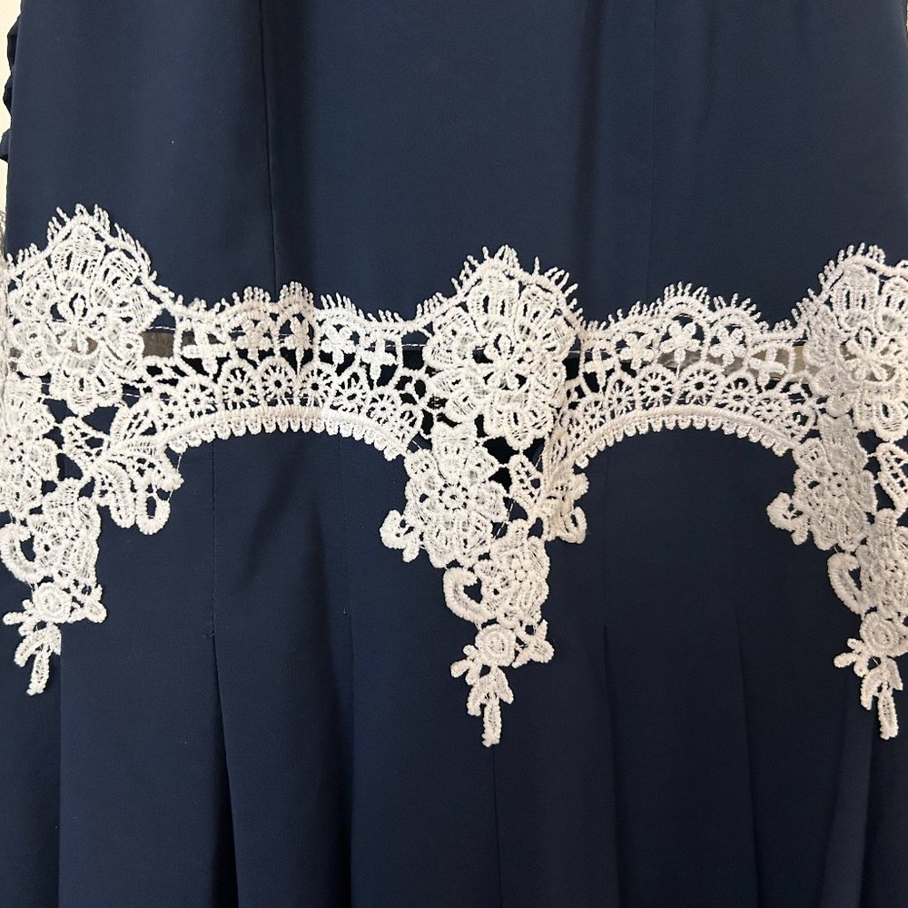 Navy Blue Halter Neck Romper with White Lacy Detail and Open Back - Picture 3 of 8